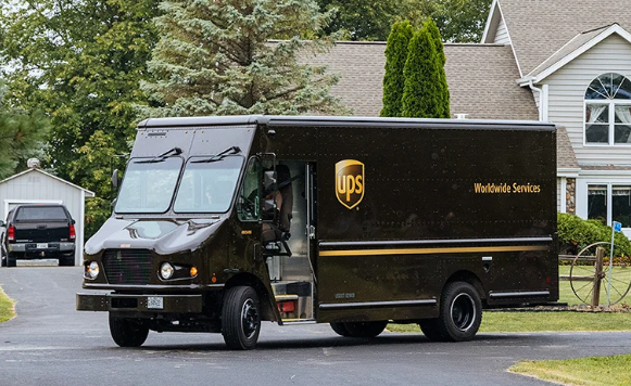 UPS delivery vehicle providing door-to-door service